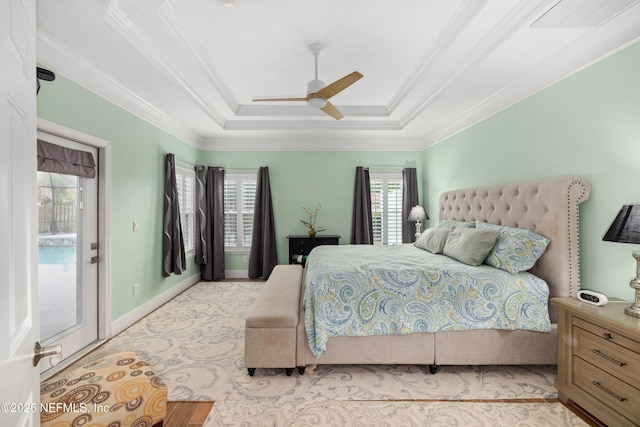 14526 Starbuck Springs Way, Jacksonville, FL 32258 - bedroom with ornamental molding, a ceiling fan, and a raised ceiling