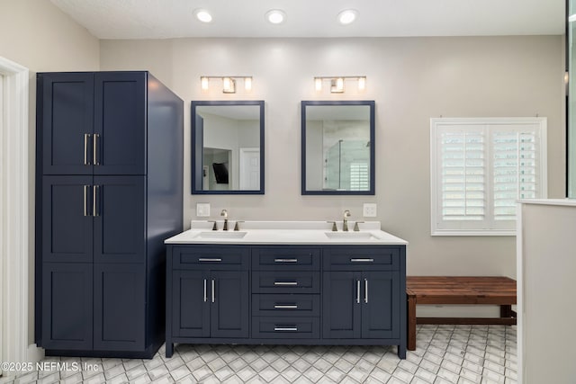 14526 Starbuck Springs Way, Jacksonville, FL 32258 - bathroom with double vanity and recessed lighting