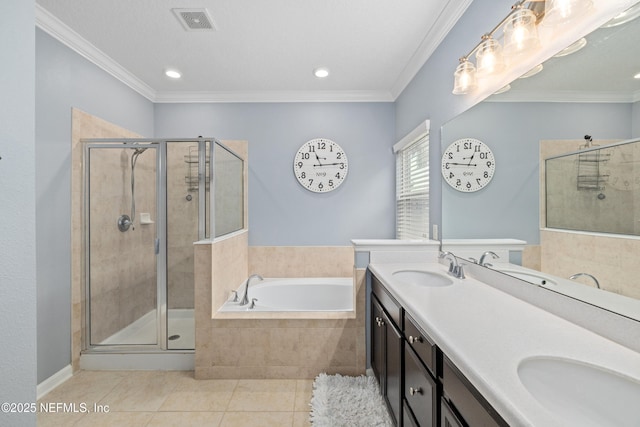 221 Saint Kitts Loop, Saint Augustine, FL 32092 - full bath featuring a garden tub, tile patterned floors, a shower stall, double vanity, and ornamental molding
