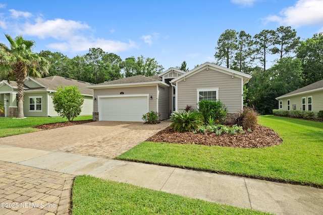 221 Saint Kitts Loop, Saint Augustine, FL 32092 - ranch-style home with driveway, a garage, and a front lawn