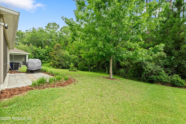 221 Saint Kitts Loop, Saint Augustine, FL 32092 - view of green lawn featuring a patio
