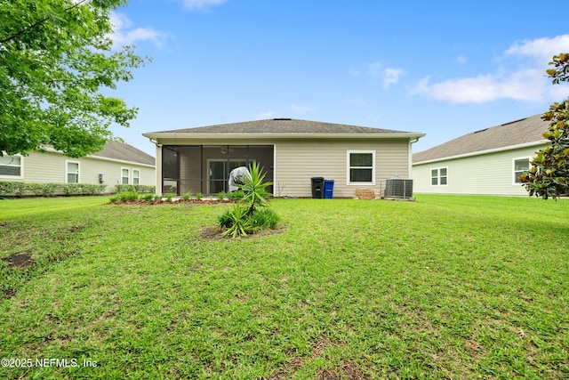 221 Saint Kitts Loop, Saint Augustine, FL 32092 - rear view of house featuring a yard and a sunroom