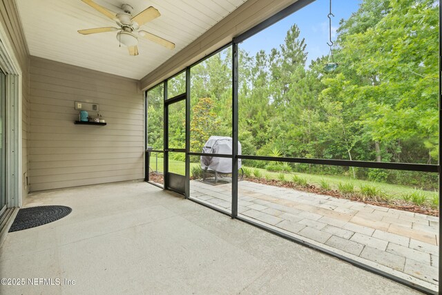 221 Saint Kitts Loop, Saint Augustine, FL 32092 - unfurnished sunroom with a ceiling fan