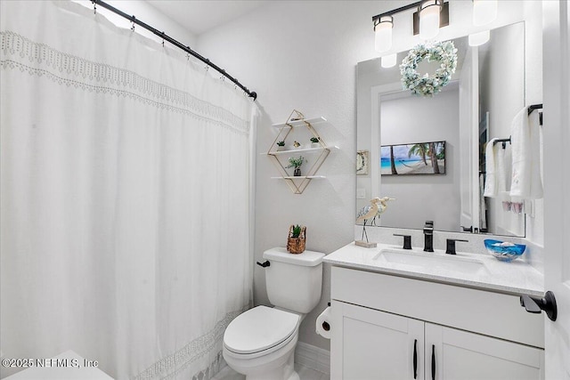 full bath featuring toilet, a shower with shower curtain, and vanity