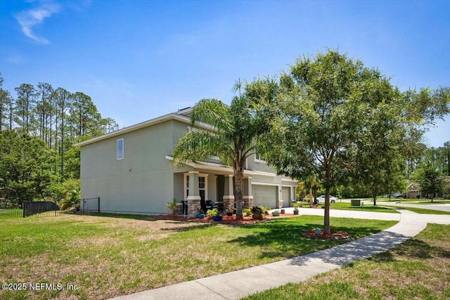 341 Aspen Leaf Dr, Jacksonville, FL 32081 - view of front of property with stone siding and concrete driveway