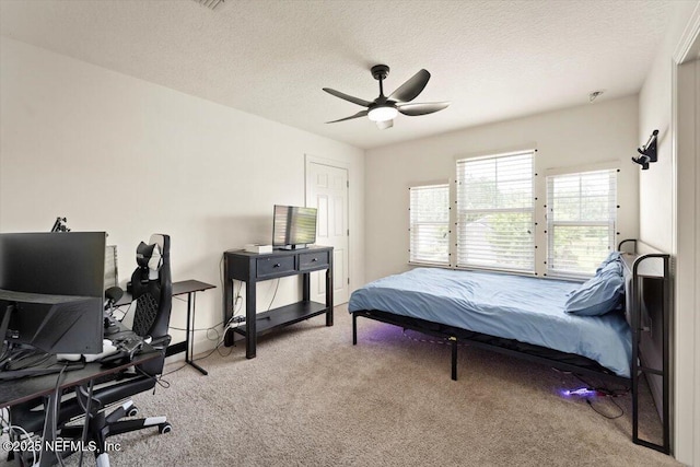 341 Aspen Leaf Dr, Jacksonville, FL 32081 - bedroom featuring carpet floors, an office area, access to outside, a textured ceiling, and ceiling fan