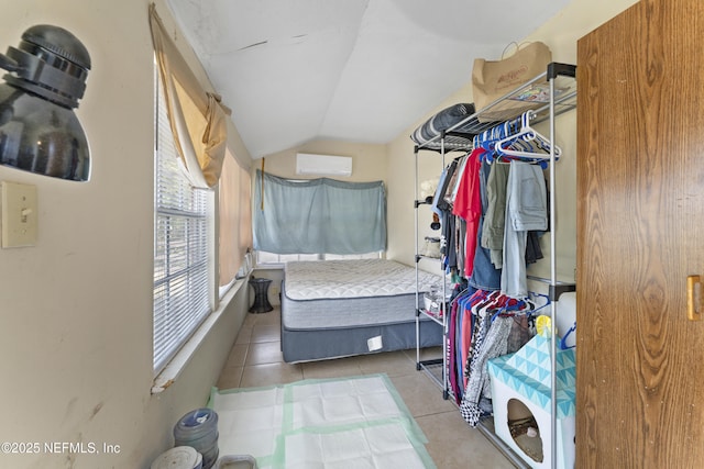37885 Kings Ferry Rd, Hilliard, FL 32046 - walk in closet featuring tile patterned floors, a wall mounted air conditioner, and vaulted ceiling