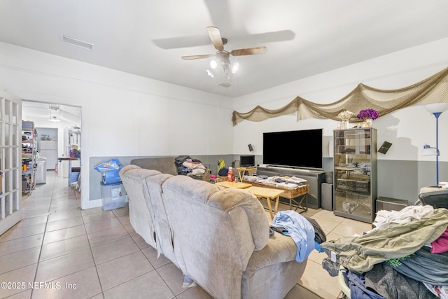 37885 Kings Ferry Rd, Hilliard, FL 32046 - living area with a ceiling fan, visible vents, and light tile patterned flooring
