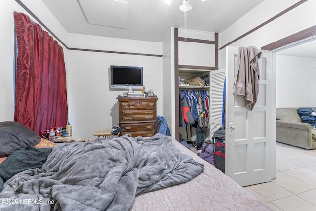 37885 Kings Ferry Rd, Hilliard, FL 32046 - bedroom featuring a closet, attic access, and light tile patterned flooring