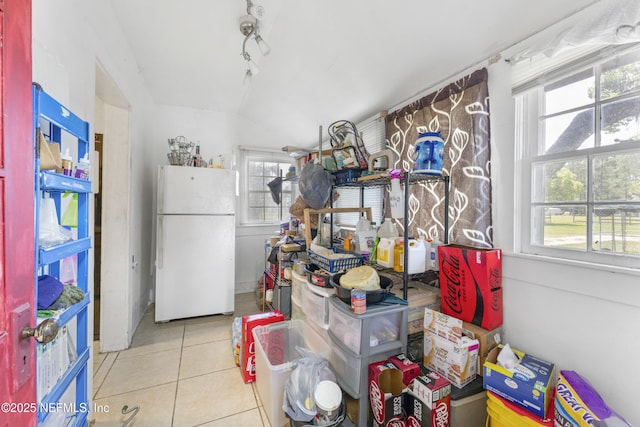37885 Kings Ferry Rd, Hilliard, FL 32046 - interior space featuring vaulted ceiling, a wealth of natural light, and tile patterned floors