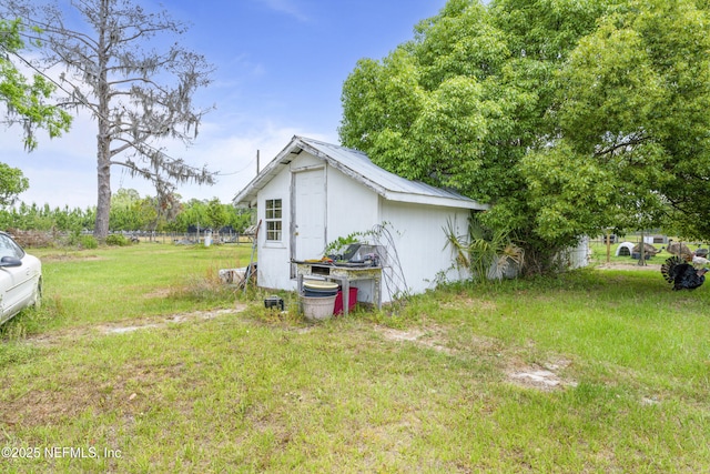 37885 Kings Ferry Rd, Hilliard, FL 32046 - exterior space with an outbuilding and a shed