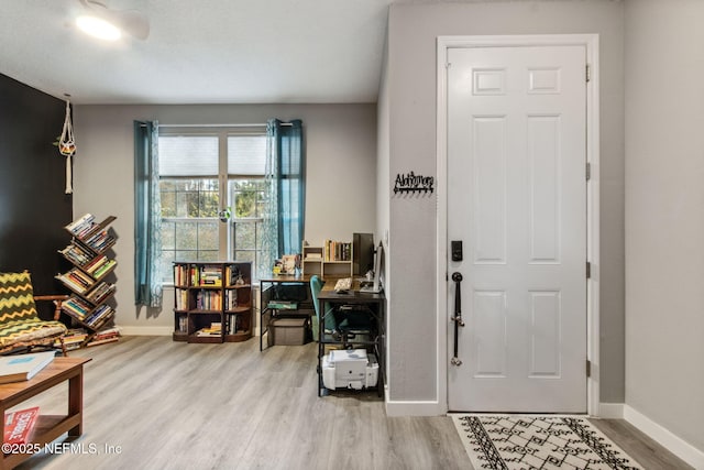 625 Oakleaf Plantation Pkwy Unit 1115, Orange Park, FL 32065 - entryway featuring baseboards and wood finished floors
