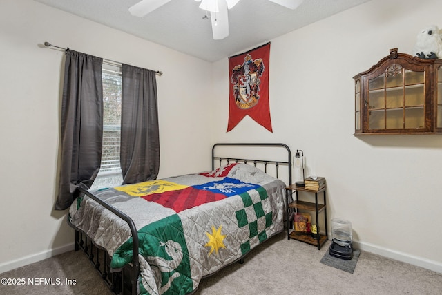 625 Oakleaf Plantation Pkwy Unit 1115, Orange Park, FL 32065 - bedroom with baseboards, a ceiling fan, and carpet floors