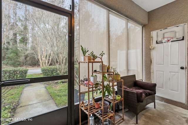 625 Oakleaf Plantation Pkwy Unit 1115, Orange Park, FL 32065 - sunroom featuring a textured wall