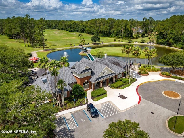 aerial view featuring a water view and golf course view