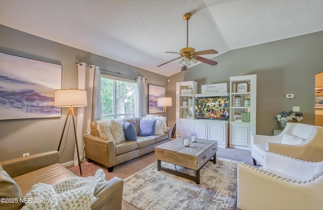 carpeted living area featuring vaulted ceiling, a textured ceiling, and a ceiling fan