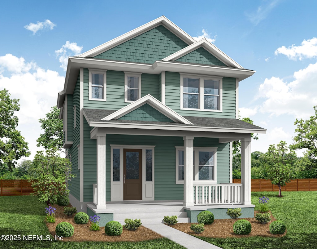 view of front of house with a porch, roof with shingles, fence, and a front lawn