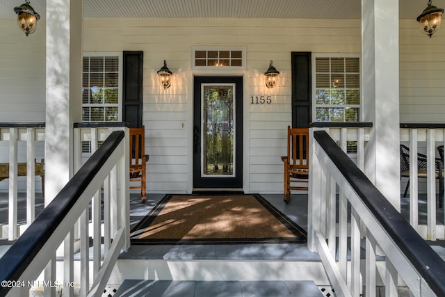 entrance to property with covered porch