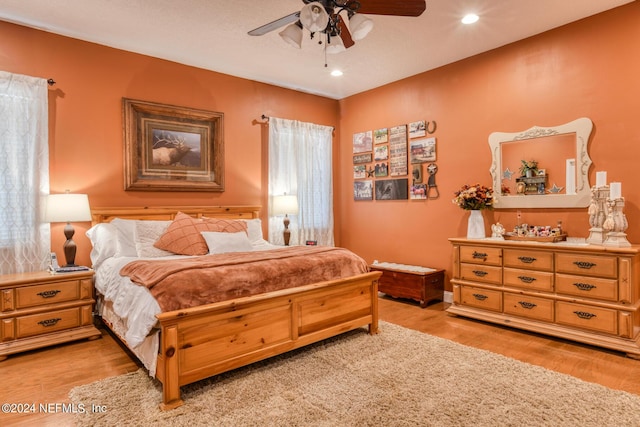 bedroom featuring ceiling fan, recessed lighting, and light wood-style floors