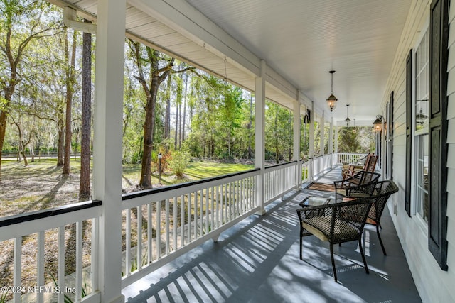 sunroom / solarium with a healthy amount of sunlight