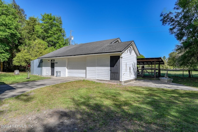 detached garage with fence
