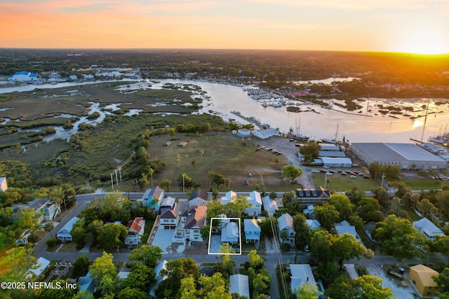 70 Weeden St + Guest House, Unit Guest House, Saint Augustine, FL 32084 - aerial view at dusk with a water view and a residential view