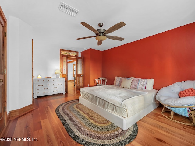70 Weeden St + Guest House, Unit Guest House, Saint Augustine, FL 32084 - bedroom with visible vents, wood finished floors, and a ceiling fan