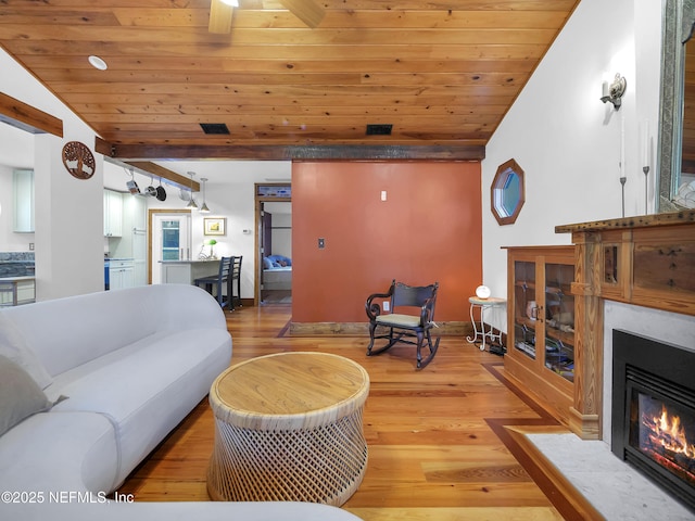 70 Weeden St + Guest House, Unit Guest House, Saint Augustine, FL 32084 - living room with wood ceiling, visible vents, a glass covered fireplace, light wood-style floors, and lofted ceiling