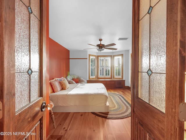 70 Weeden St + Guest House, Unit Guest House, Saint Augustine, FL 32084 - bedroom with visible vents, wood finished floors, and ceiling fan