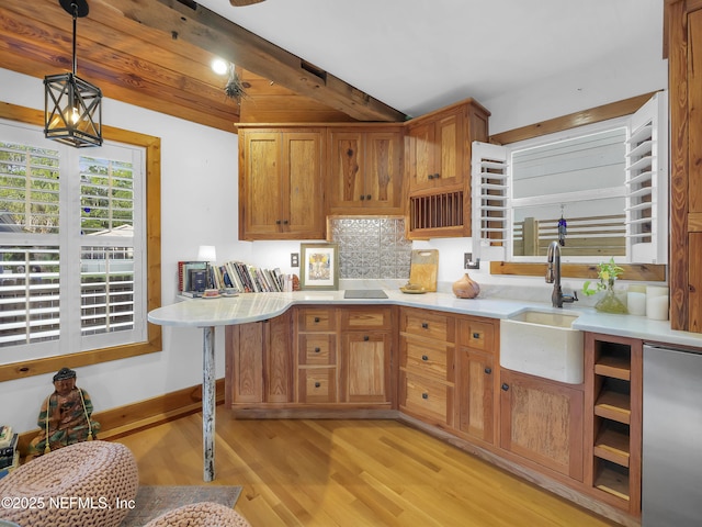 70 Weeden St + Guest House, Unit Guest House, Saint Augustine, FL 32084 - kitchen with a sink, fridge, tasteful backsplash, light wood-type flooring, and light countertops
