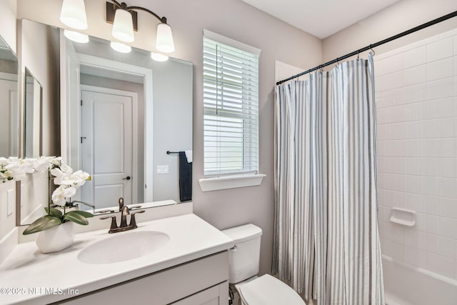 269 Fremont Ave, Saint Augustine, FL 32095 - full bathroom with vanity, shower / tub combo with curtain, and toilet