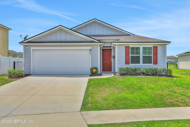 ranch-style house featuring fence, a garage, a front lawn, and driveway