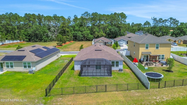 birds eye view of property with a residential view