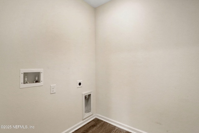 clothes washing area with baseboards, hookup for a washing machine, dark wood-type flooring, hookup for an electric dryer, and laundry area