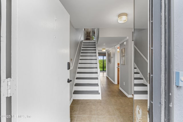 890 A1A Beach Blvd Unit 39, Saint Augustine, FL 32080 - stairs featuring tile patterned floors and baseboards