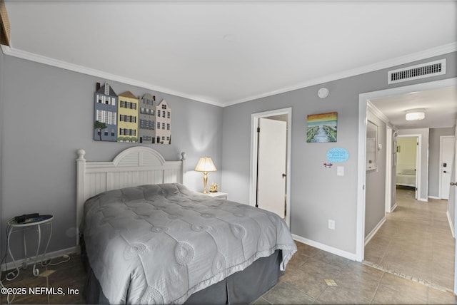 890 A1A Beach Blvd Unit 39, Saint Augustine, FL 32080 - bedroom featuring crown molding and tile patterned floors