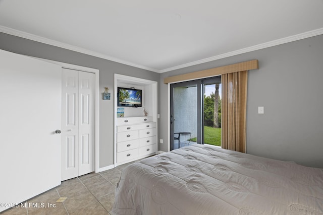 890 A1A Beach Blvd Unit 39, Saint Augustine, FL 32080 - tiled bedroom with access to outside, ornamental molding, and a closet