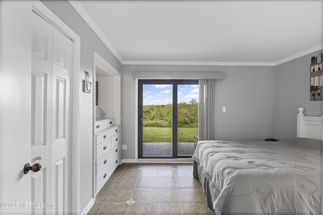 890 A1A Beach Blvd Unit 39, Saint Augustine, FL 32080 - bedroom featuring access to outside, crown molding, and tile patterned flooring