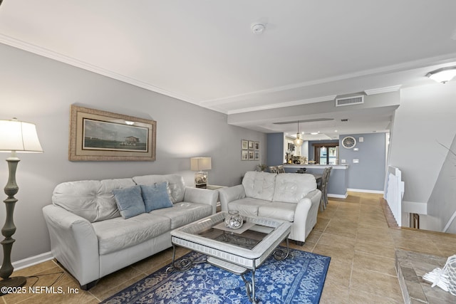 890 A1A Beach Blvd Unit 39, Saint Augustine, FL 32080 - tiled living area with crown molding