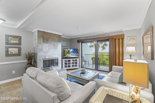 890 A1A Beach Blvd Unit 39, Saint Augustine, FL 32080 - living room featuring a tiled fireplace and ornamental molding