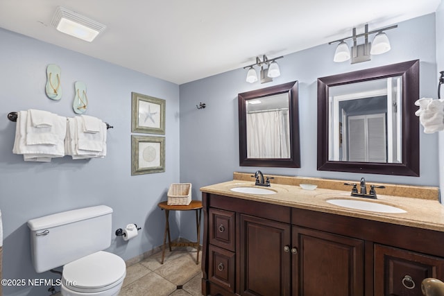 890 A1A Beach Blvd Unit 39, Saint Augustine, FL 32080 - bathroom with double vanity and tile patterned floors