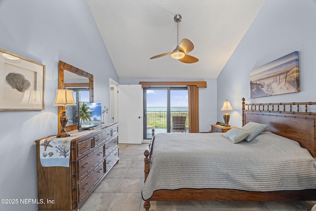 890 A1A Beach Blvd Unit 39, Saint Augustine, FL 32080 - bedroom featuring access to outside, high vaulted ceiling, a textured ceiling, ceiling fan, and light tile patterned flooring