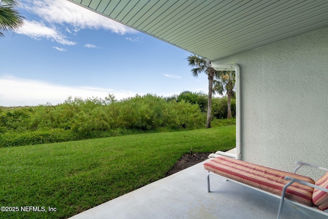 890 A1A Beach Blvd Unit 39, Saint Augustine, FL 32080 - view of grassy yard with a patio