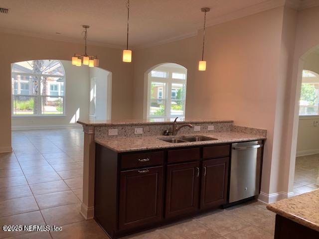 71 Utina Way, Saint Augustine, FL 32084 - kitchen with a sink, crown molding, arched walkways, and dishwasher