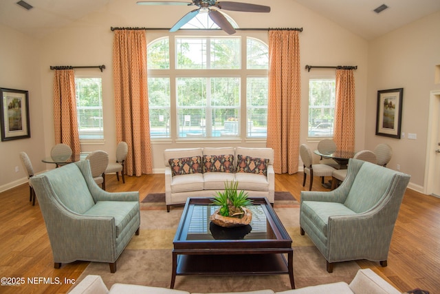 71 Utina Way, Saint Augustine, FL 32084 - living area featuring lofted ceiling, baseboards, ceiling fan, visible vents, and wood finished floors