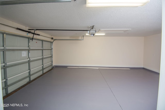 71 Utina Way, Saint Augustine, FL 32084 - garage with baseboards and a garage door opener