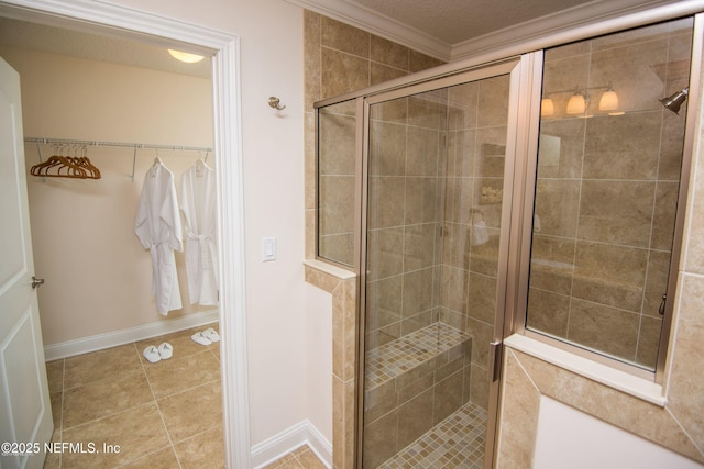 71 Utina Way, Saint Augustine, FL 32084 - bathroom with a shower stall, ornamental molding, tile patterned floors, and baseboards
