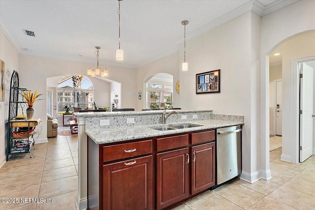 71 Utina Way, Saint Augustine, FL 32084 - kitchen featuring stainless steel dishwasher, light tile patterned flooring, arched walkways, and a sink