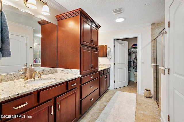 71 Utina Way, Saint Augustine, FL 32084 - bathroom with vanity, a shower stall, and ornamental molding