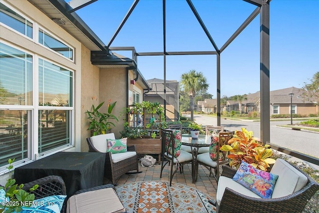 71 Utina Way, Saint Augustine, FL 32084 - view of patio / terrace with outdoor dining area, a lanai, and a residential view
